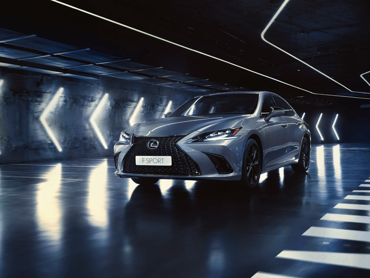 A Lexus ES parked outside a building 
