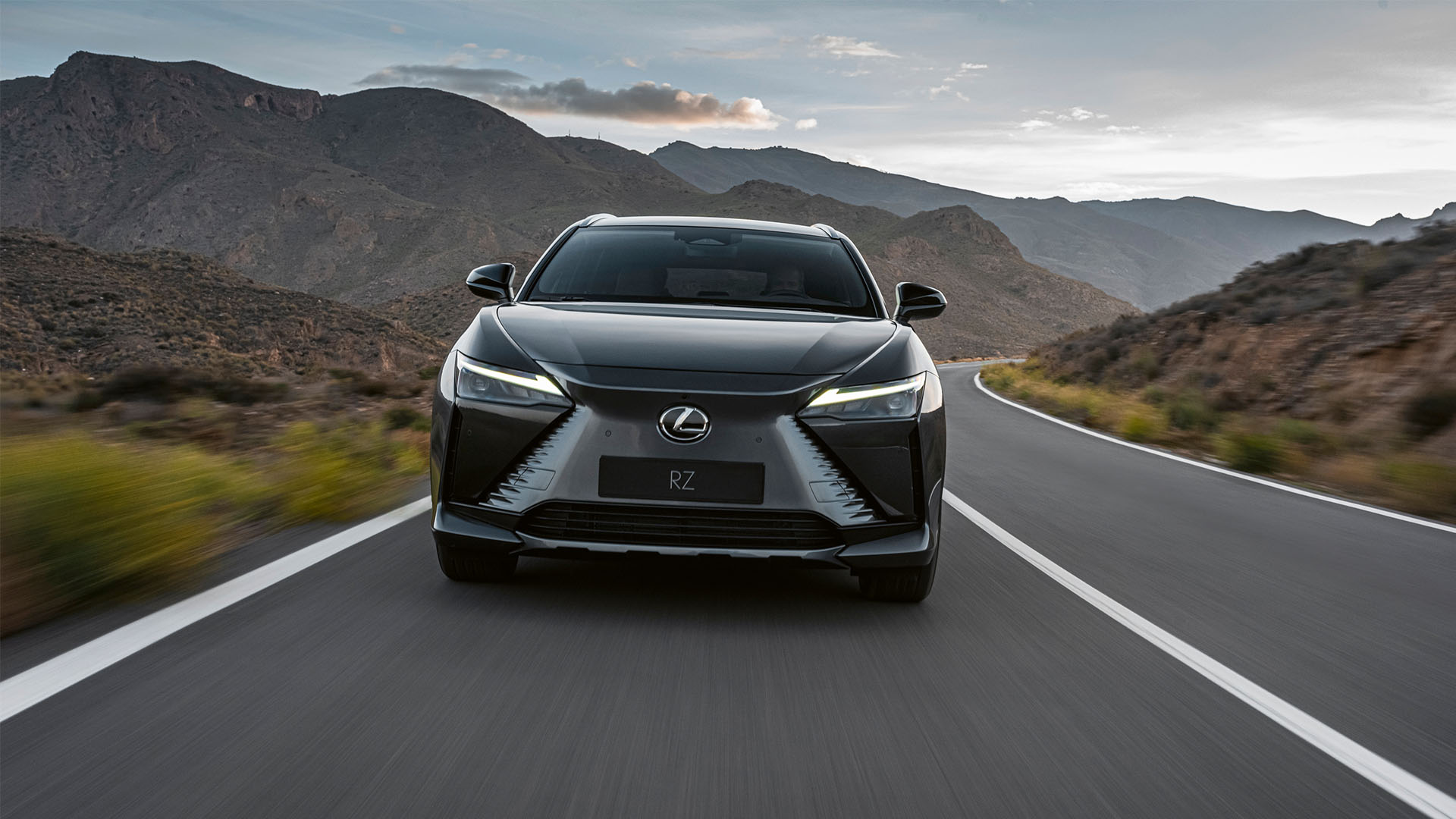 Front view of the Lexus RZ 450e driving 