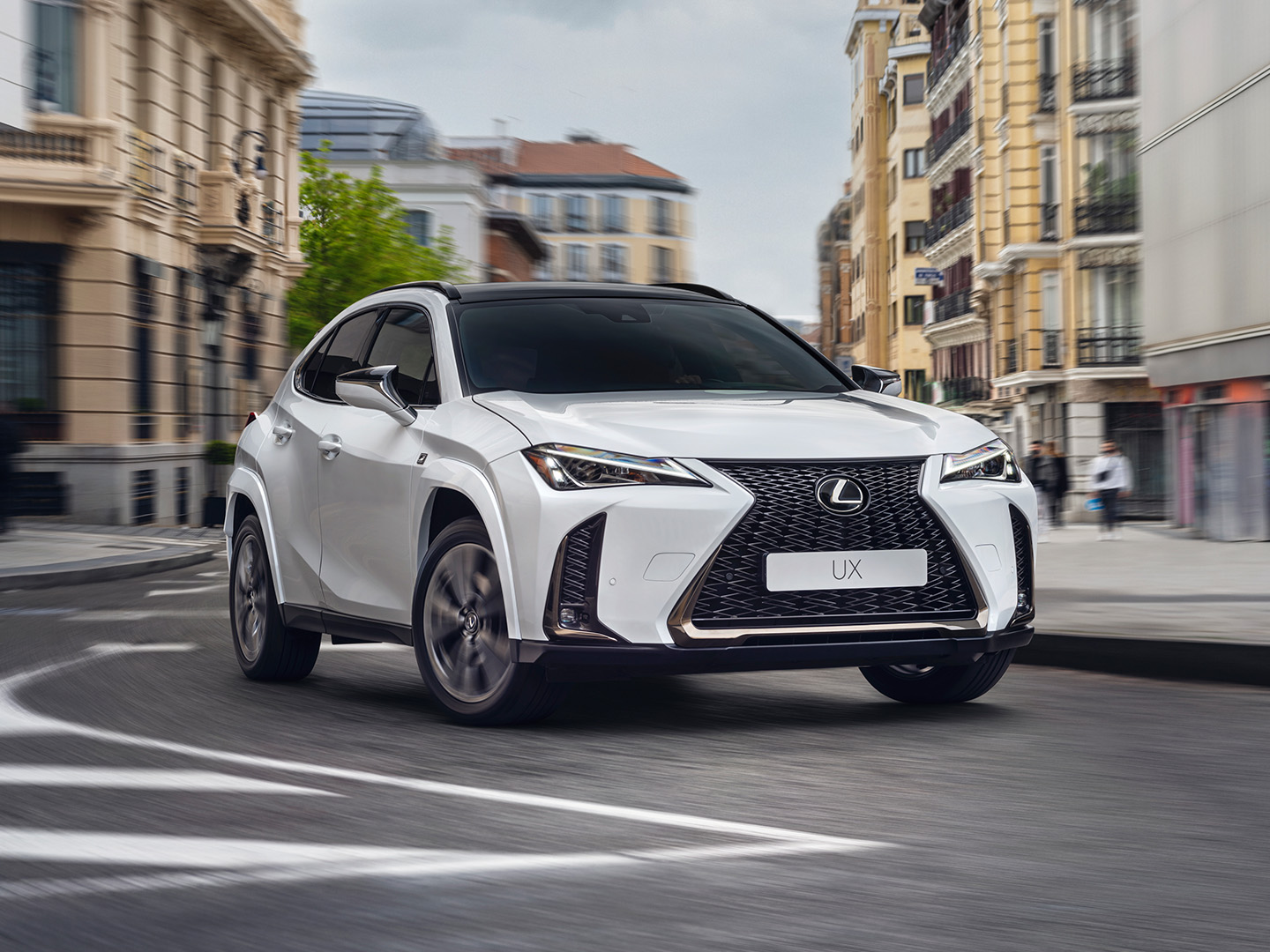 Lexus UX driving on a road