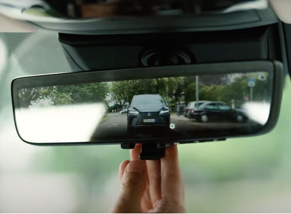 A Lexus seen through a rear view mirror