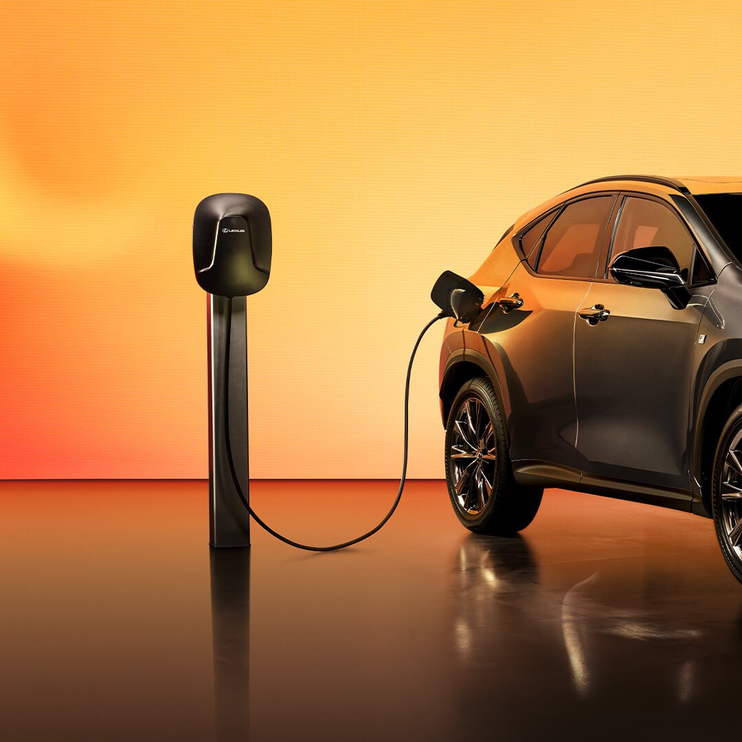 Lexus NX plugged into a charging station
